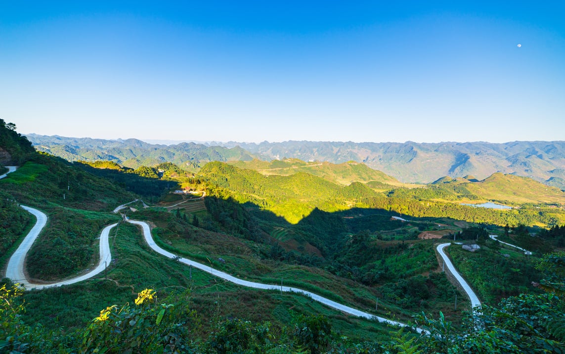 Ha Giang karst geopark mountain landscape in North Vietnam. Winding road in stunning scenery. Ha Giang motorbike loop, famous travel destination bikers easy riders.